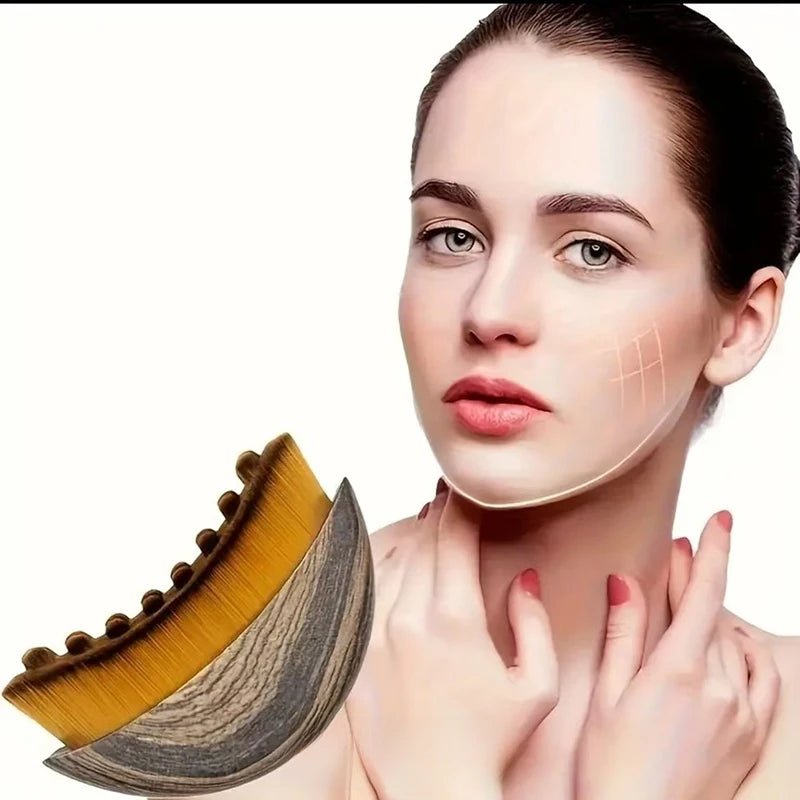 Portable dry facial brush with soft bristles, contoured for lymphatic massage and gentle exfoliation for face sculpting at home.