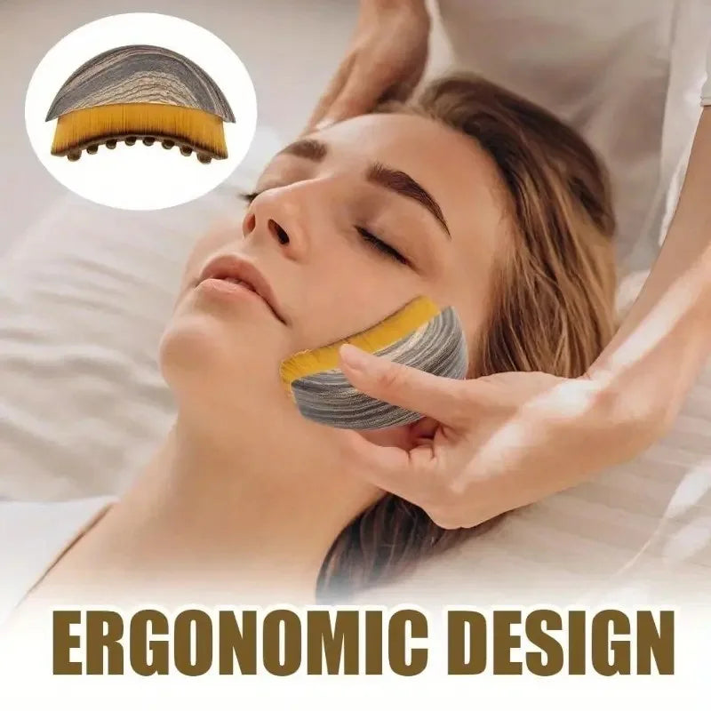 Portable dry facial brush with soft bristles, contoured design for lymphatic massage and gentle exfoliation, ideal for home spa use.